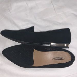 Black pointed flats